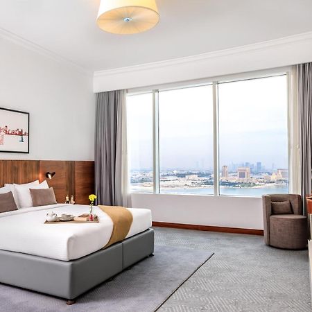 ซัมเมอร์เซ็ต เวสต์ เบย์ โดฮา Hotel ภายนอก รูปภาพ A bedroom at the hotel