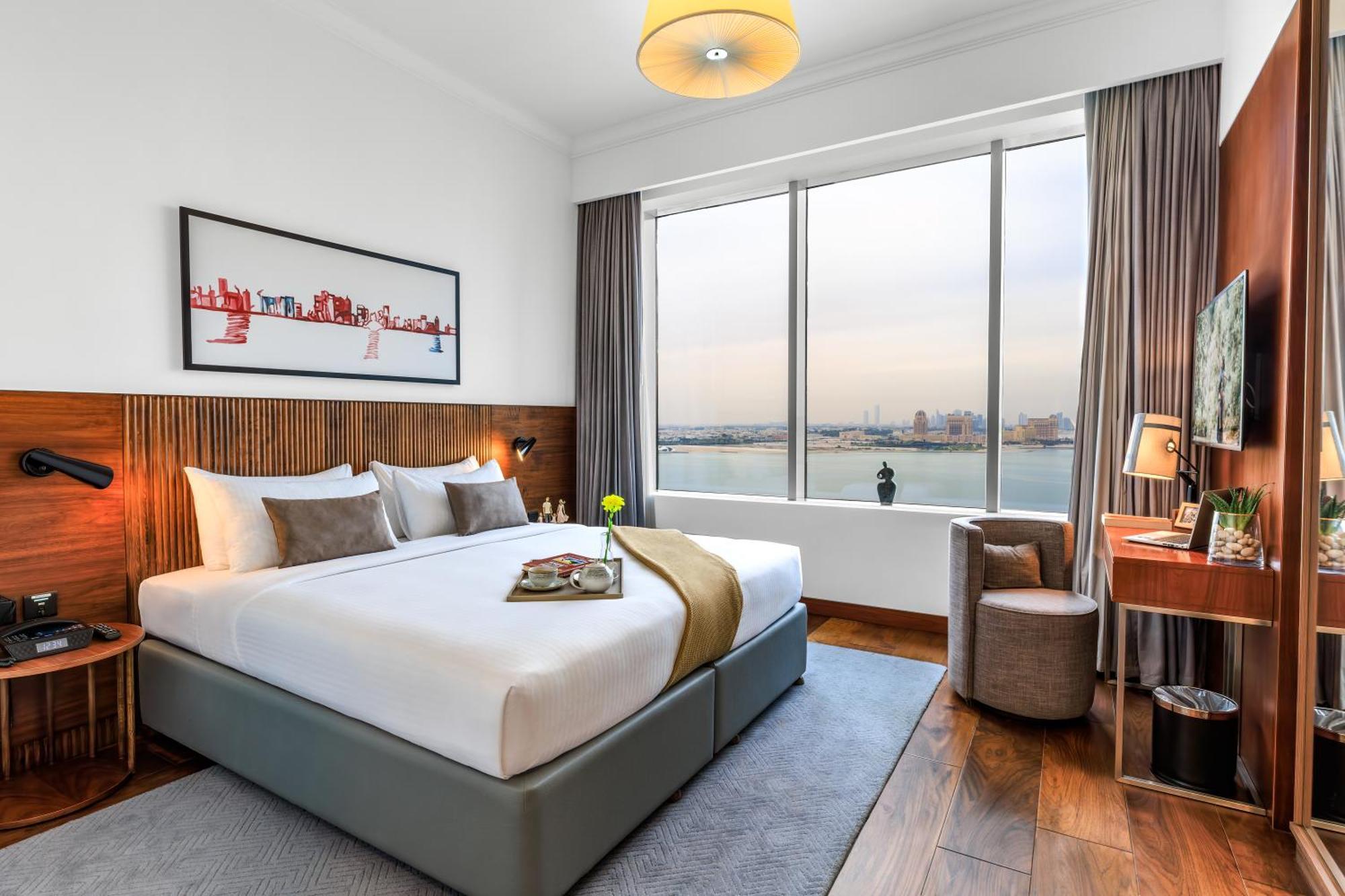 ซัมเมอร์เซ็ต เวสต์ เบย์ โดฮา Hotel ภายนอก รูปภาพ A bedroom at the hotel