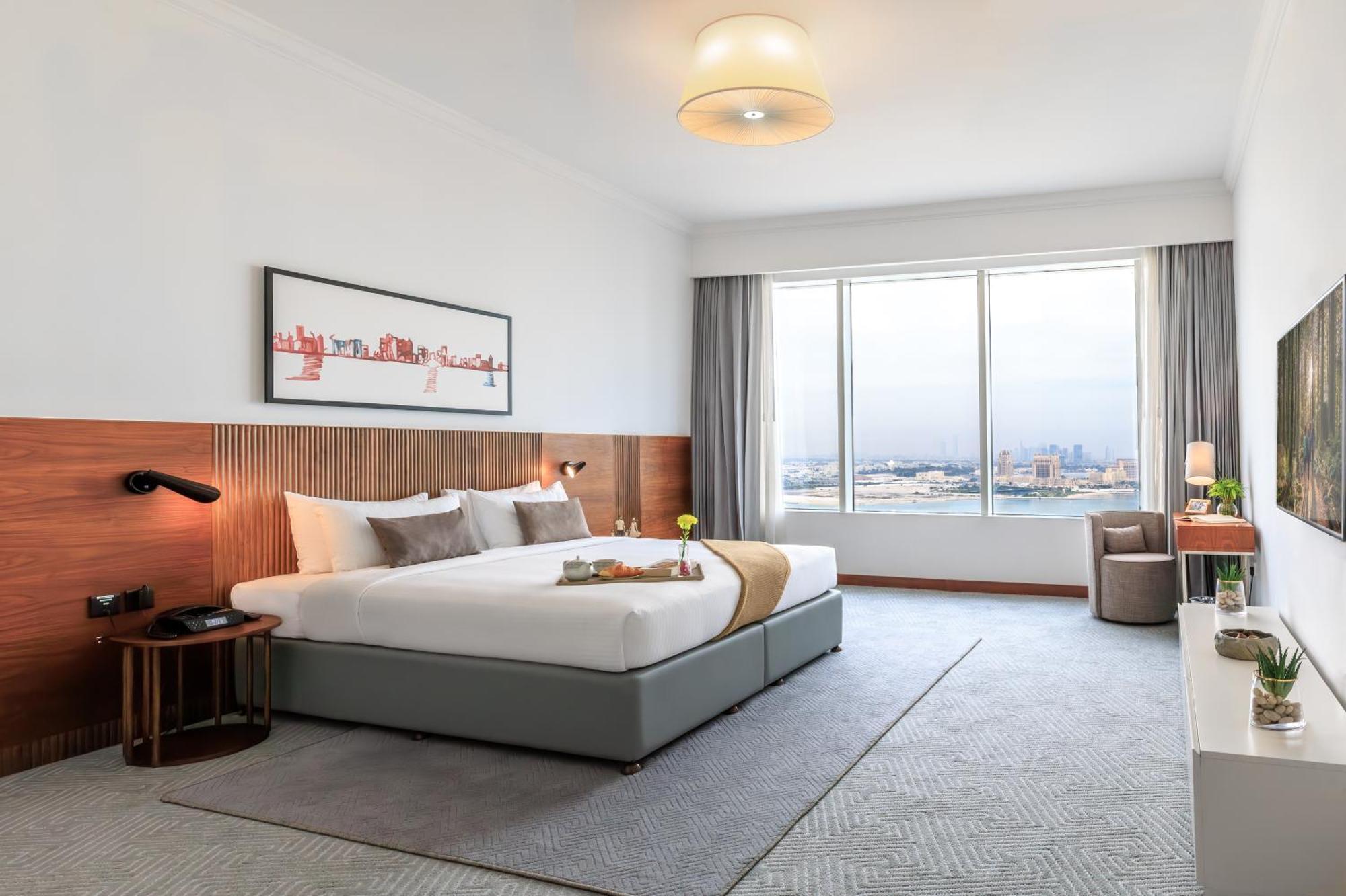 ซัมเมอร์เซ็ต เวสต์ เบย์ โดฮา Hotel ภายนอก รูปภาพ A bedroom at the hotel
