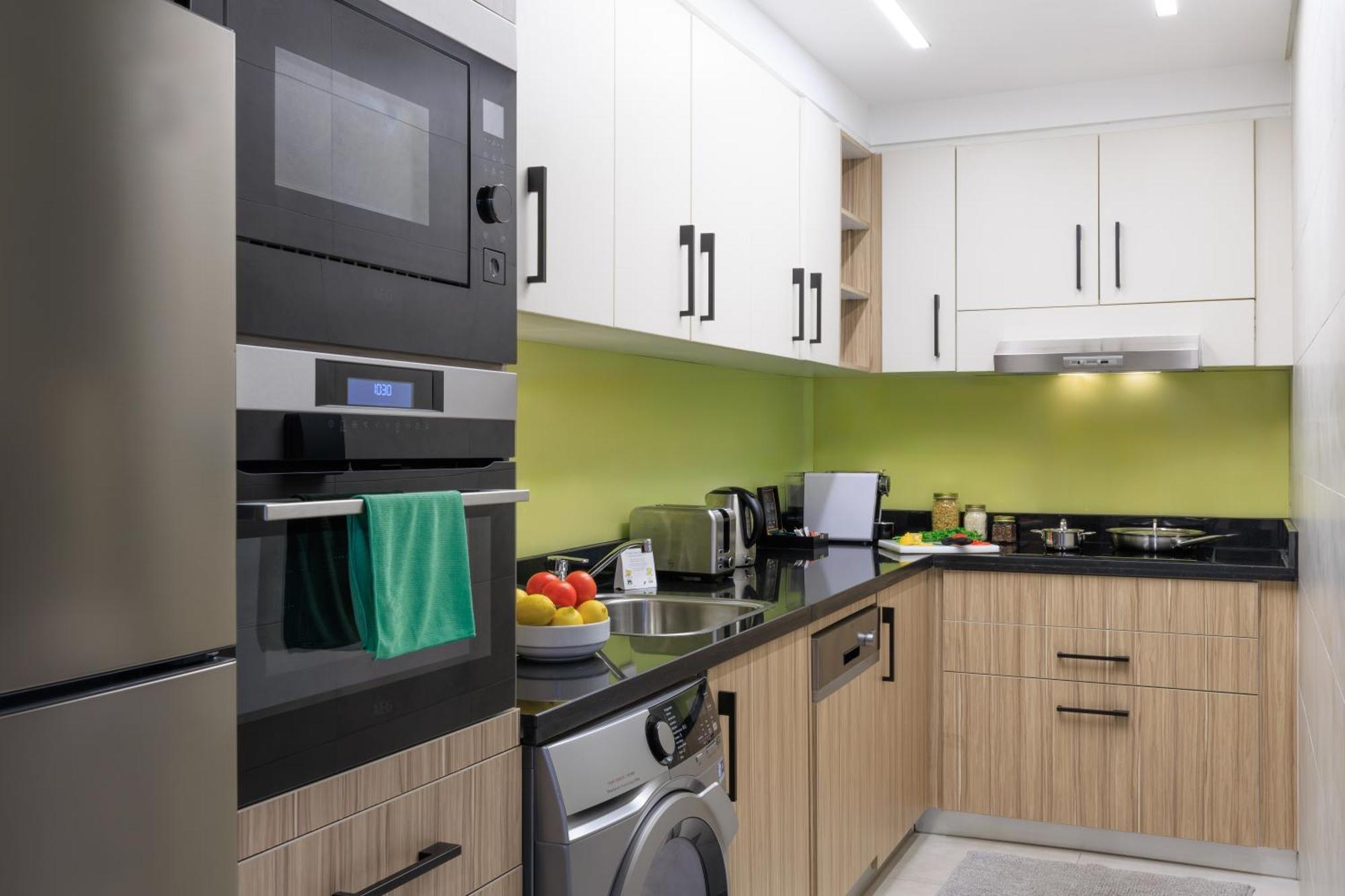 ซัมเมอร์เซ็ต เวสต์ เบย์ โดฮา Hotel ภายนอก รูปภาพ A modern kitchen